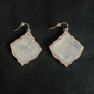 Kendra Scott earrings.